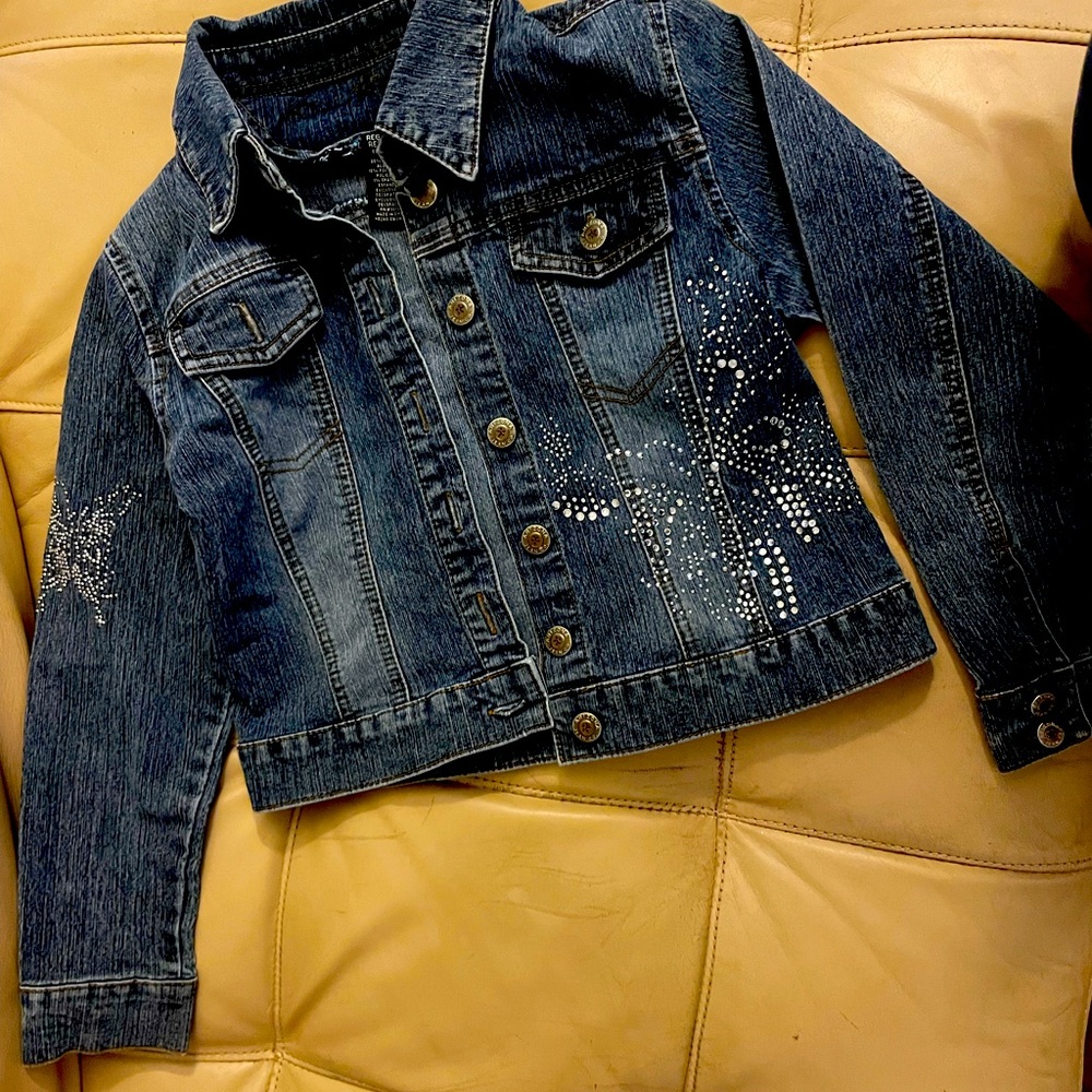 EUC. Girls Jean jacket. Size medium. Butterfly decor.